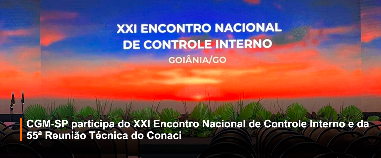 Telão com imagem de um por do sol com o seguinte texto 