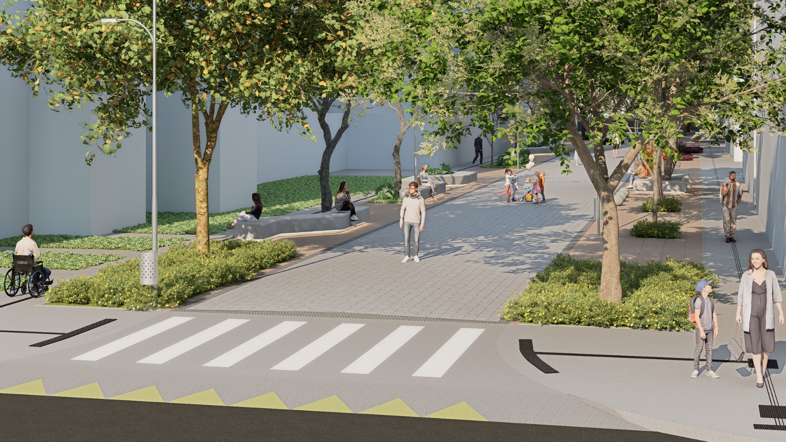 Imagem ilustrativa de uma via urbana ampla e arborizada, com calçada e pista em tons de cinza-claro, faixa de pedestres branca em destaque e elementos de sinalização no chão em amarelo. O espaço é cercado por árvores de troncos marrons e copas verdes, com canteiros de vegetação baixa em tons de verde e amarelo ao redor. Ao longo do percurso, há bancos de concreto cinza ocupados por pessoas sentadas, enquanto outras caminham pelo local. À esquerda, uma pessoa em cadeira de rodas se desloca pela calçada acessível. No centro e ao fundo, adultos e crianças circulam e interagem, incluindo um pequeno grupo infantil com roupas coloridas. À direita, uma mulher de vestido cinza e um menino com boné azul caminham próximos à borda da calçada. As paredes dos edifícios ao redor são lisas e claras, em tons de cinza e branco, reforçando a sensação de espaço organizado, iluminado e integrado à natureza.